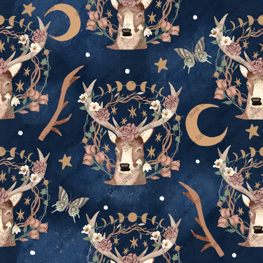 Decorative pattern with deer heads, floral elements, and celestial symbols on a dark blue background.