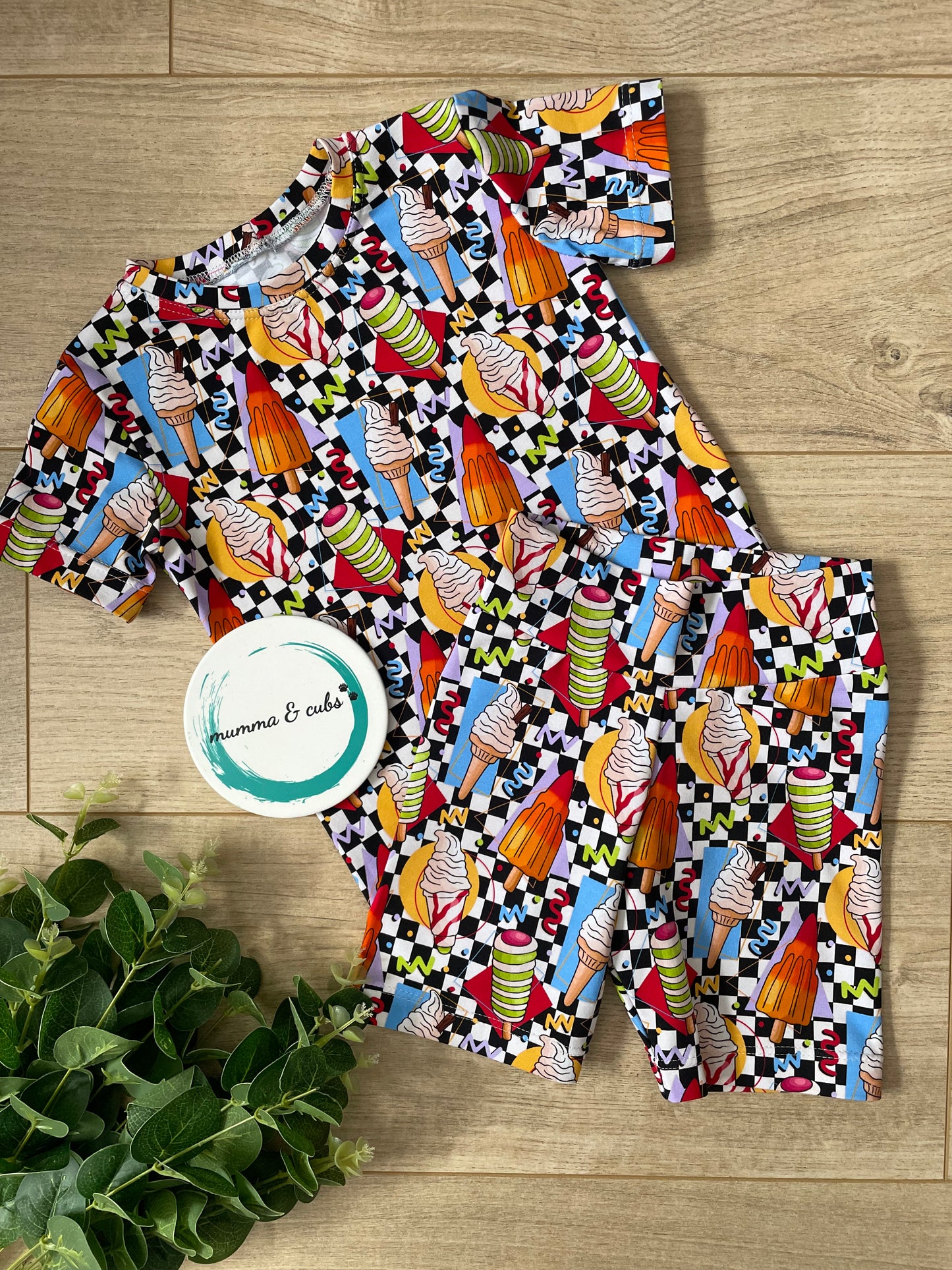 Colorful ice cream patterned fabric on a t-shirt and shorts set