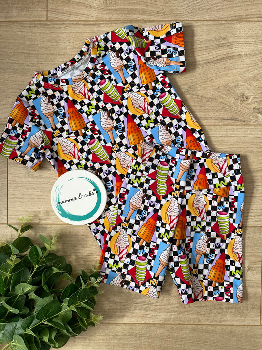 Colorful ice cream patterned fabric on a t-shirt and shorts set